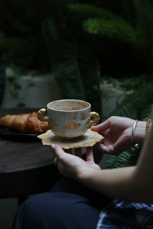 Handcrafted meaning: making pottery, brewing coffee, doing what you love.